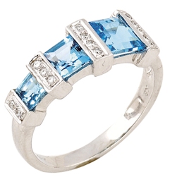 Bridges to stardom... glory and fame is not far when you dress like a star! 18K White Gold Ring with Blue Topaz and Diamonds.